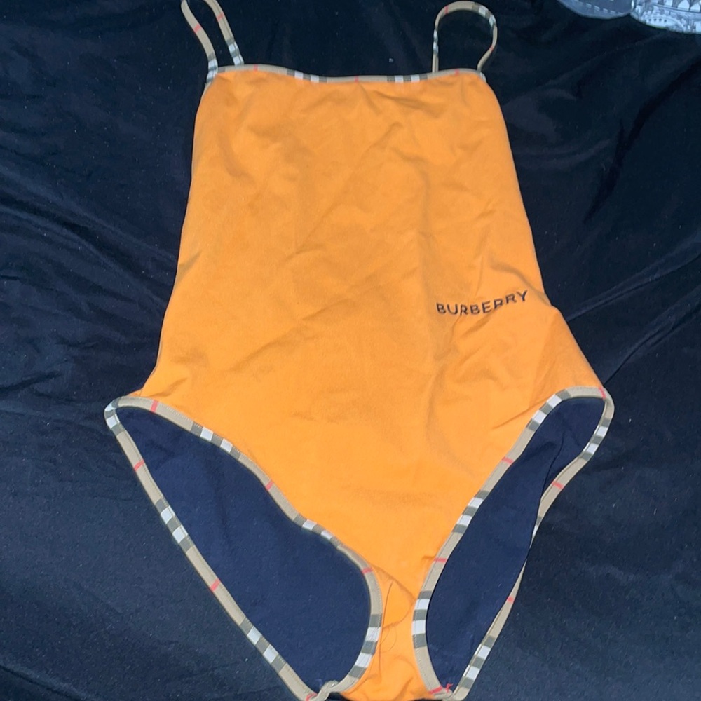 Burberry orange bathing suit one piece.